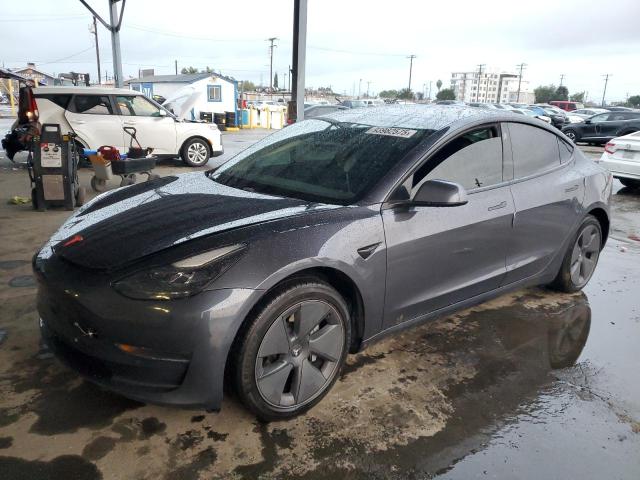 TESLA MODEL 3 2021 with VIN 5YJ3E1EA1MF870871 - Photo from auction