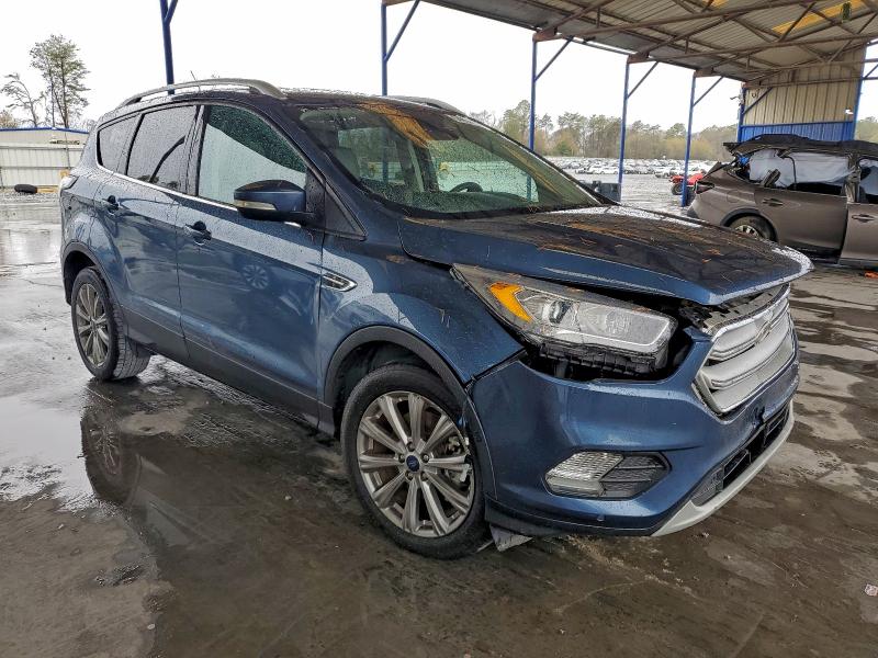 Photo 4 from auction – 2018 FORD ESCAPE TIT with VIN 1FMCU0J98JUC44385