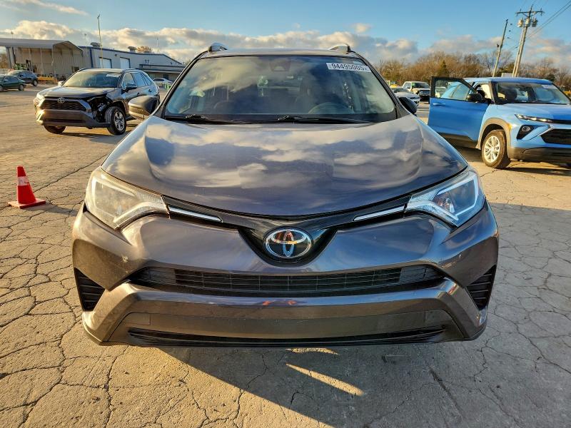 Photo 5 from auction – 2017 TOYOTA RAV4 LE with VIN JTMZFREV3HJ715391