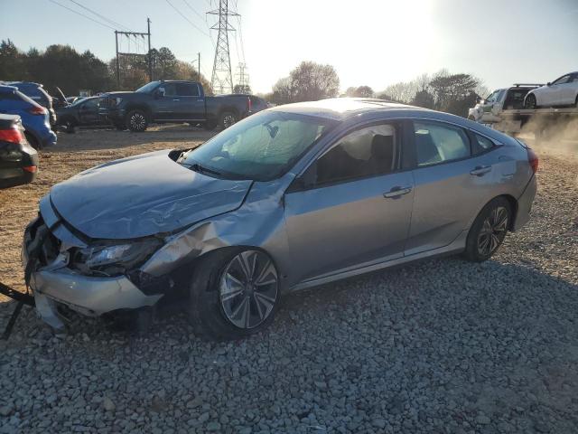 HONDA CIVIC EXL 2016 with VIN 19XFC1F70GE212538 - Photo from auction