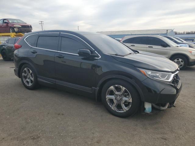 Photo 4 from auction – 2019 HONDA CR-V with VIN 7FARW2H86KE052379