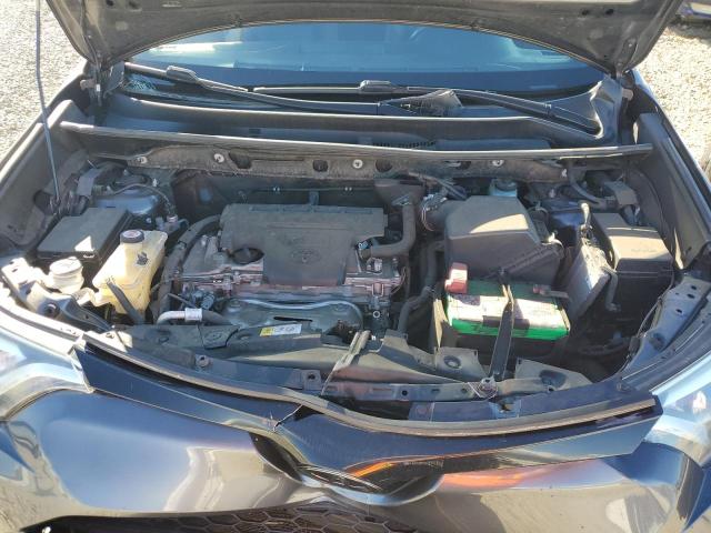 Photo 12 from auction – 2018 TOYOTA RAV4 SE with VIN JTMJFREV0JJ212646