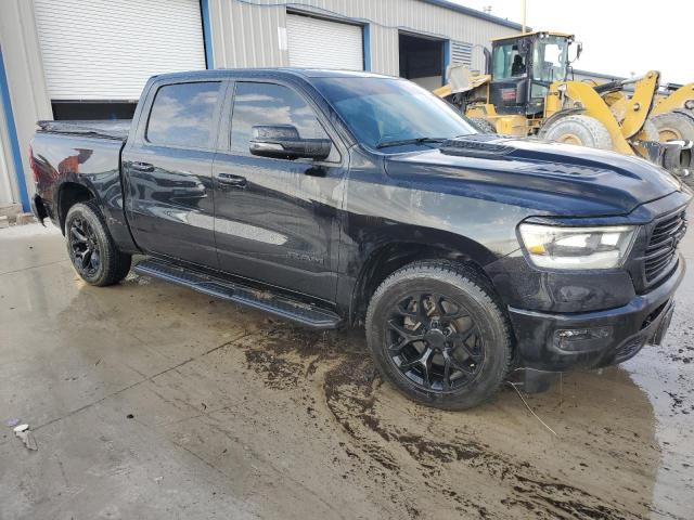 Photo 4 from auction – 2023 RAM 1500 LARAM with VIN 1C6SRFJT6PN541522