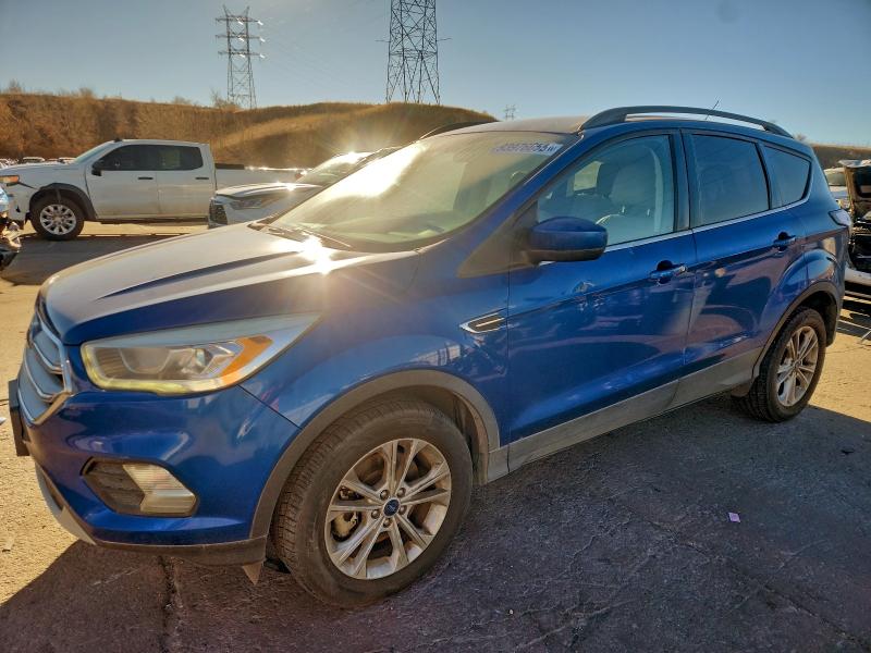 FORD ESCAPE SE 2017 with VIN 1FMCU9G90HUE47700 - Photo from auction
