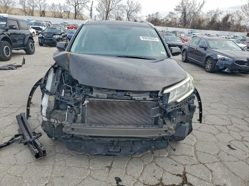 Photo 5 from auction – 2016 HONDA CR-V EXL with VIN 5J6RM4H71GL132157