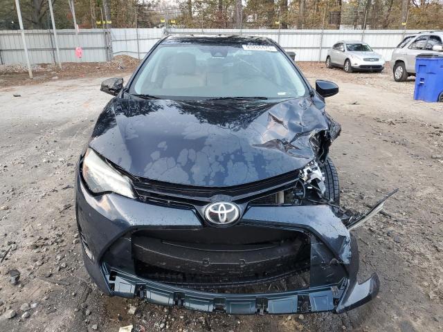 Photo 5 from auction – 2017 TOYOTA COROLLA L with VIN 5YFBURHE5HP694008