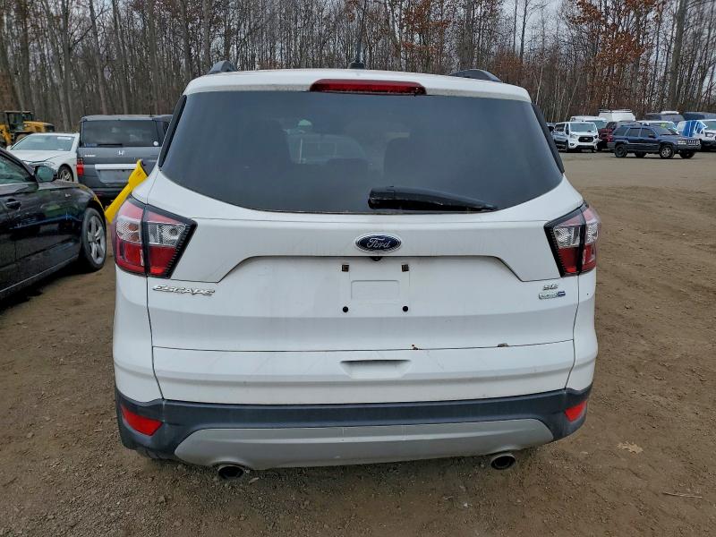 Photo 6 from auction – 2018 FORD ESCAPE with VIN 1FMCU9GDXJUA74949
