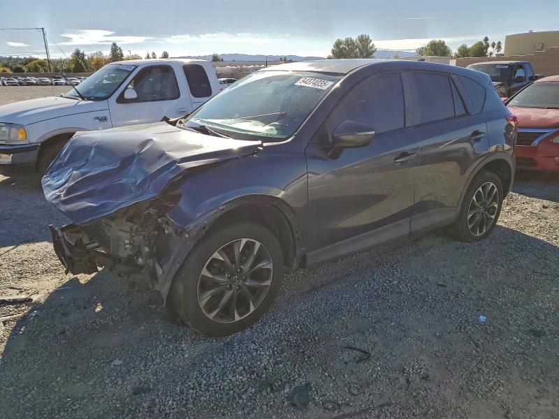 MAZDA CX-5 GT 2016 with VIN JM3KE2DYXG0885475 - Photo from auction