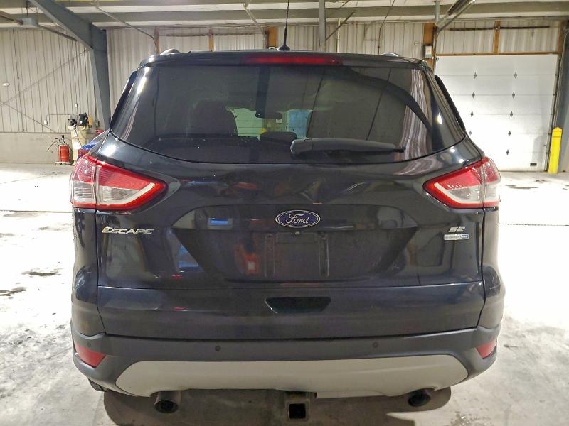 Photo 6 from auction – 2014 FORD ESCAPE SE with VIN 1FMCU9G98EUB42084