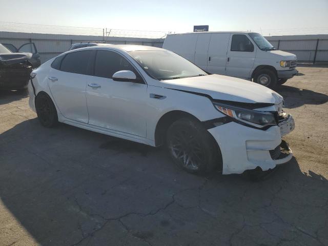 Photo 4 from auction – 2018 KIA OPTIMA LX with VIN 5XXGT4L34JG219904