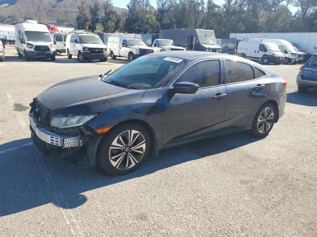 HONDA CIVIC EX 2016 with VIN 19XFC1F3XGE212320 - Photo from auction