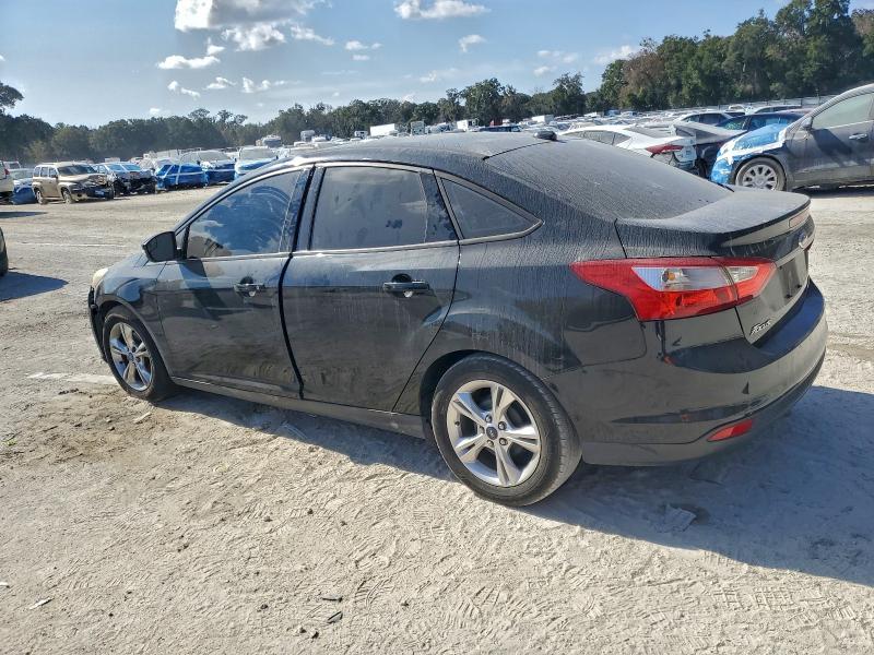 Photo 2 from auction – 2014 FORD FOCUS SE with VIN 1FADP3F20EL165260