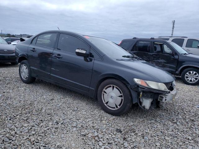 Photo 4 from auction – 2010 HONDA CIVIC HYBR with VIN JHMFA3F27AS005461