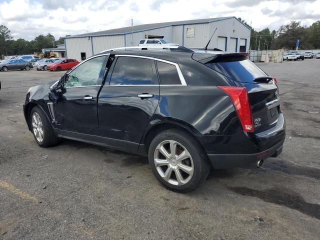 Снимка 2 от търг – 2013 CADILLAC SRX PERFOR с VIN 3GYFNDE30DS591994
