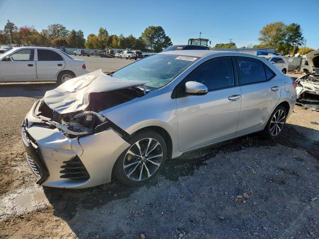 TOYOTA COROLLA L 2017 with VIN 5YFBURHE8HP695699 - Photo from auction