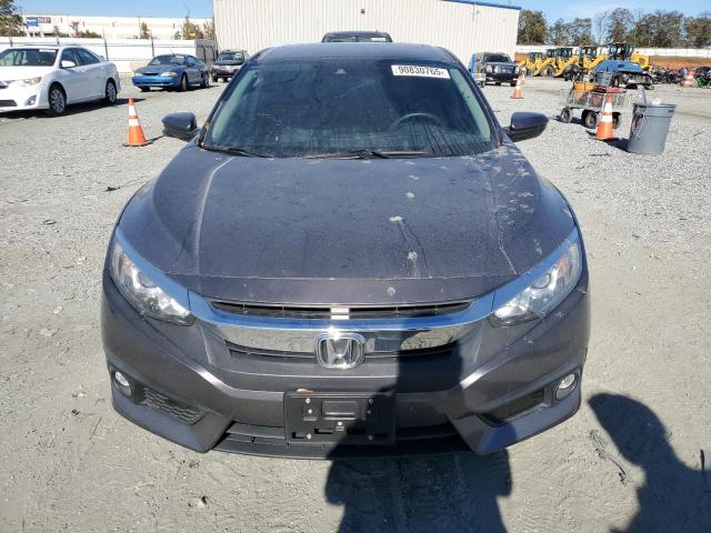Photo 5 from auction – 2018 HONDA CIVIC with VIN JHMFC1F41JX025739