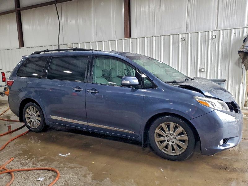 Photo 4 from auction – 2015 TOYOTA SIENNA XLE with VIN 5TDDK3DCXFS095075