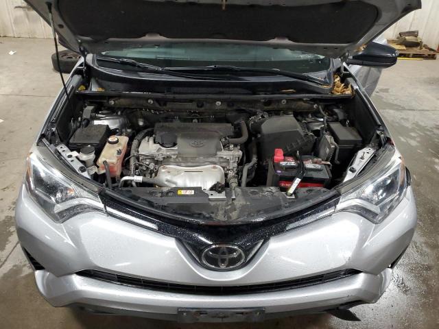 Photo 12 from auction – 2018 TOYOTA RAV4 LE with VIN JTMBFREV6JJ252802