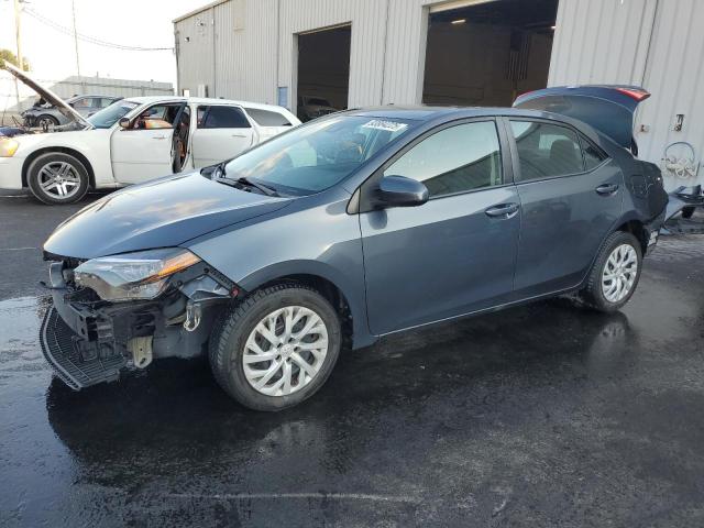 TOYOTA COROLLA L 2018 with VIN 5YFBURHE4JP752082 - Photo from auction
