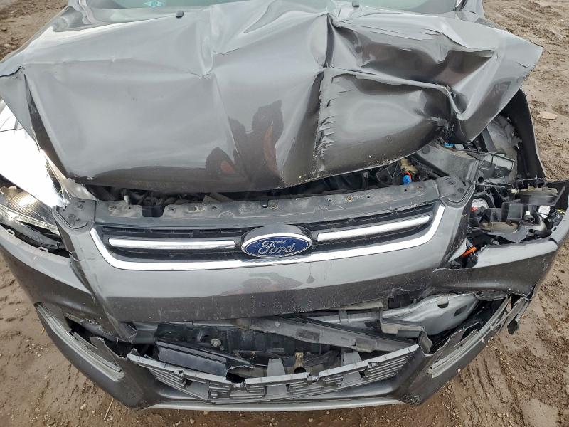 Photo 12 from auction – 2015 FORD ESCAPE TIT with VIN 1FMCU0J91FUC07251