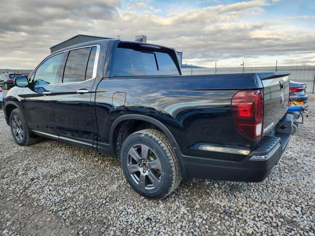 Photo 2 from auction – 2020 HONDA RIDGELINE with VIN 5FPYK3F74LB015679
