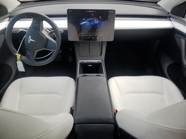 Photo 8 from auction – 2023 TESLA MODEL Y with VIN 7SAYGAEE0PF697080