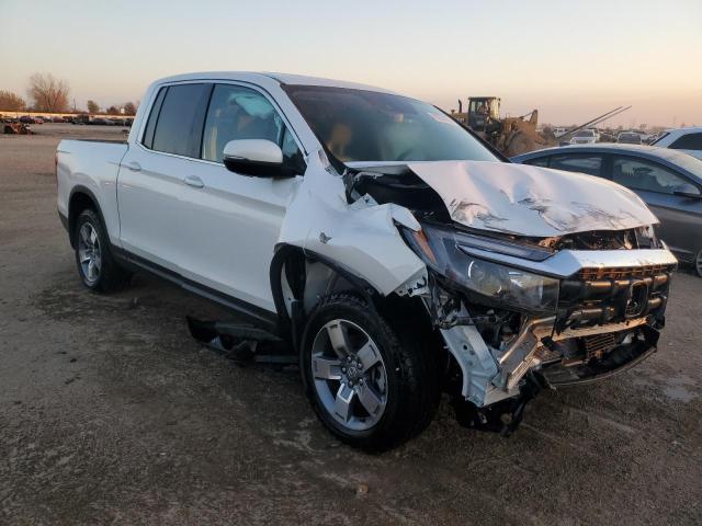 Photo 4 from auction – 2024 HONDA RIDGELINE with VIN 5FPYK3F50RB027013