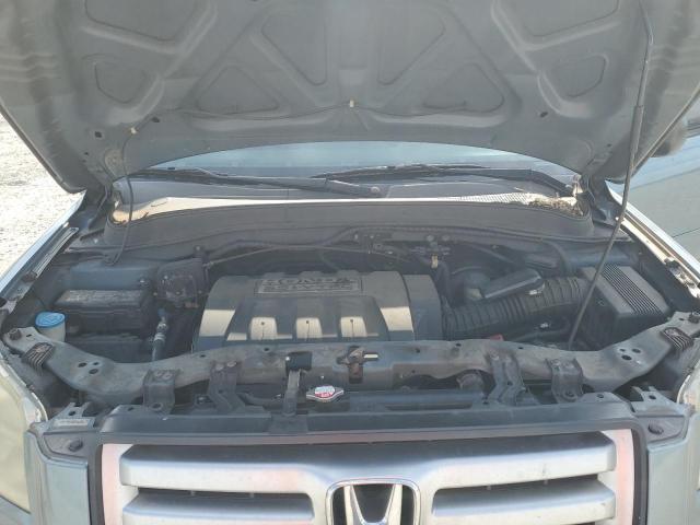 Photo 12 from auction – 2006 HONDA PILOT LX with VIN 5FNYF28156B046301