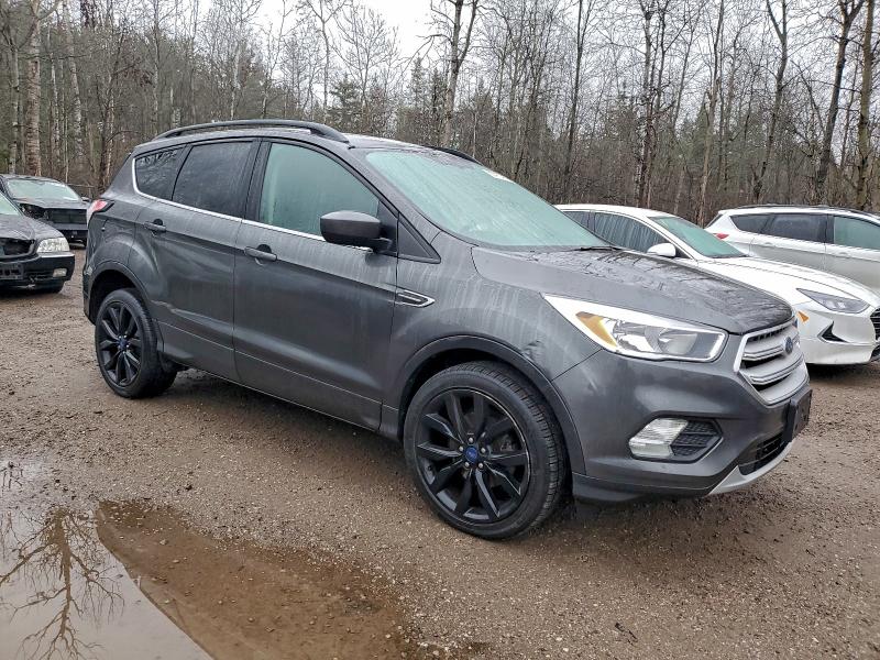 Photo 4 from auction – 2018 FORD ESCAPE SE with VIN 1FMCU0GD5JUC51368