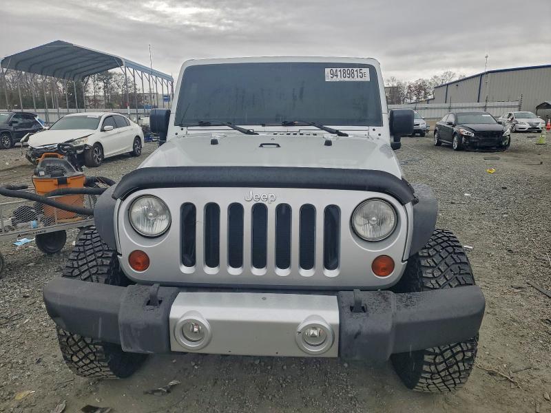 Photo 5 from auction – 2011 JEEP WRANGLER U with VIN 1J4BA5H15BL505124