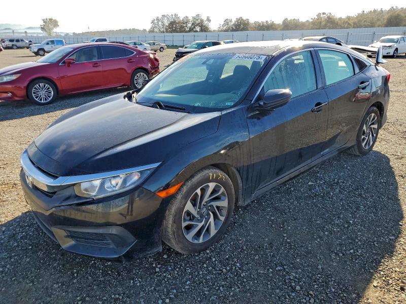 HONDA CIVIC EX 2018 with VIN 2HGFC2F74JH576156 - Photo from auction