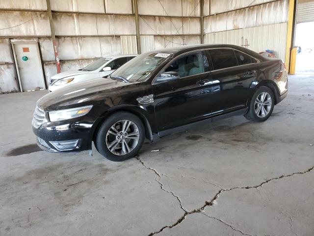 FORD TAURUS SEL 2016 with VIN 1FAHP2E85GG119971 - Photo from auction