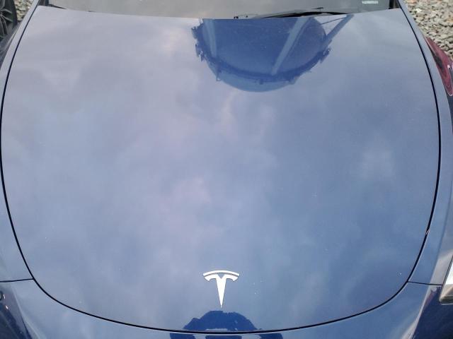 Photo 11 from auction – 2022 TESLA MODEL Y with VIN 7SAYGDEE7NF481225