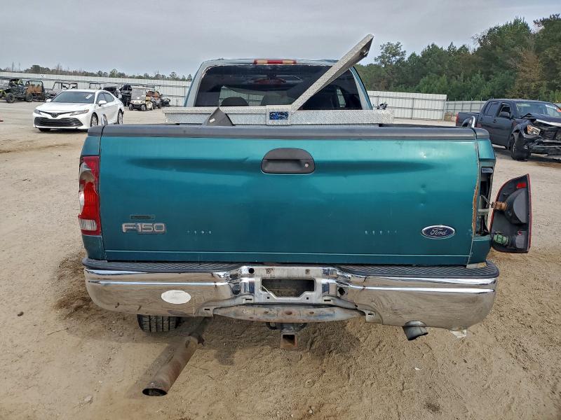 Photo 6 from auction – 1998 FORD F150 with VIN 1FTZX1765WNB08922