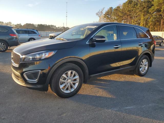 KIA SORENTO LX 2016 with VIN 5XYPG4A33GG167550 - Photo from auction