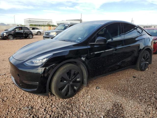 TESLA MODEL Y 2023 with VIN 7SAYGDEE2PA136751 - Photo from auction