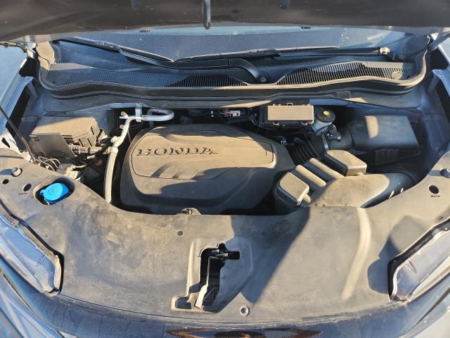 Photo 12 from auction – 2022 HONDA PILOT SE with VIN 5FNYF5H21NB027575