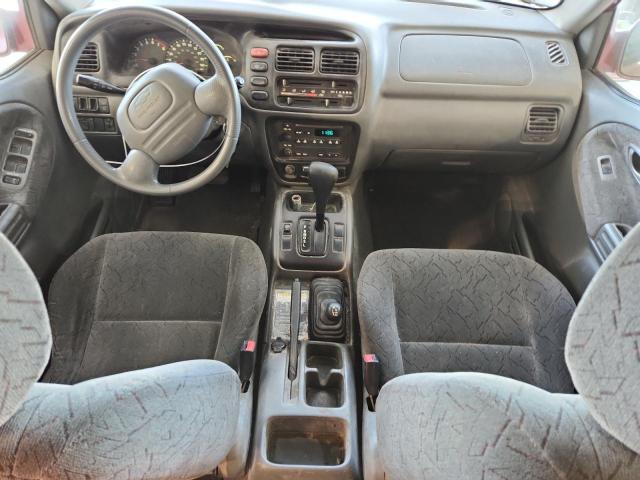 Photo 8 from auction – 2001 CHEVROLET TRACKER LT with VIN 2CNBJ634X16913246
