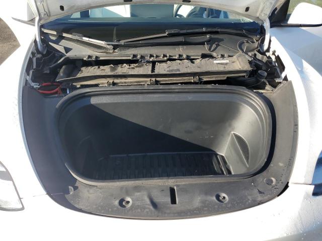 Photo 12 from auction – 2021 TESLA MODEL Y with VIN 5YJYGAEE0MF283905
