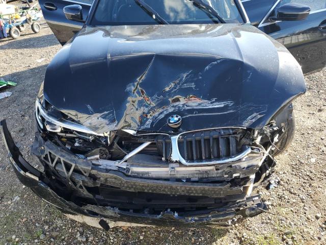 Photo 11 from auction – 2021 BMW 330I with VIN 3MW5R1J07M8B94308