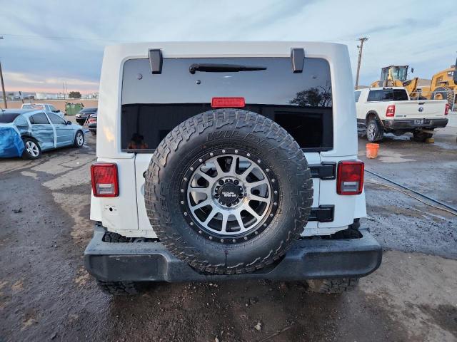 Photo 6 from auction – 2016 JEEP WRANGLER U with VIN 1C4BJWFG1GL191207