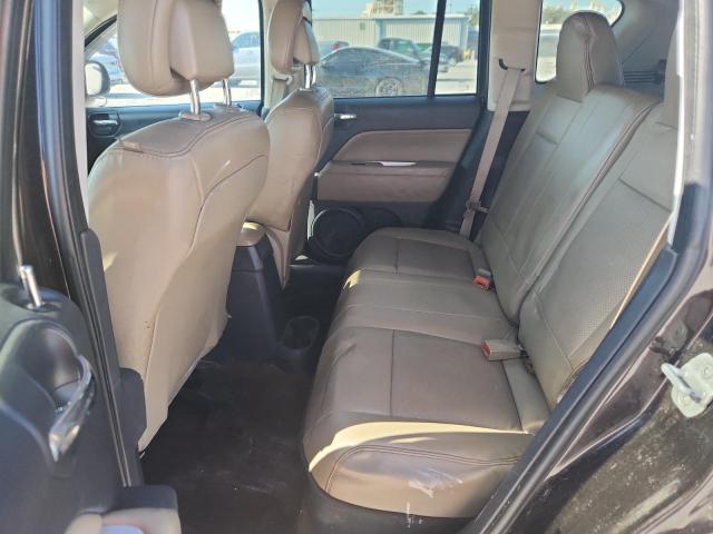 Photo 11 from auction – 2014 JEEP COMPASS LA with VIN 1C4NJCEA8ED814693