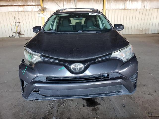 Photo 5 from auction – 2017 TOYOTA RAV4 LE with VIN JTMZFREV7HJ119572