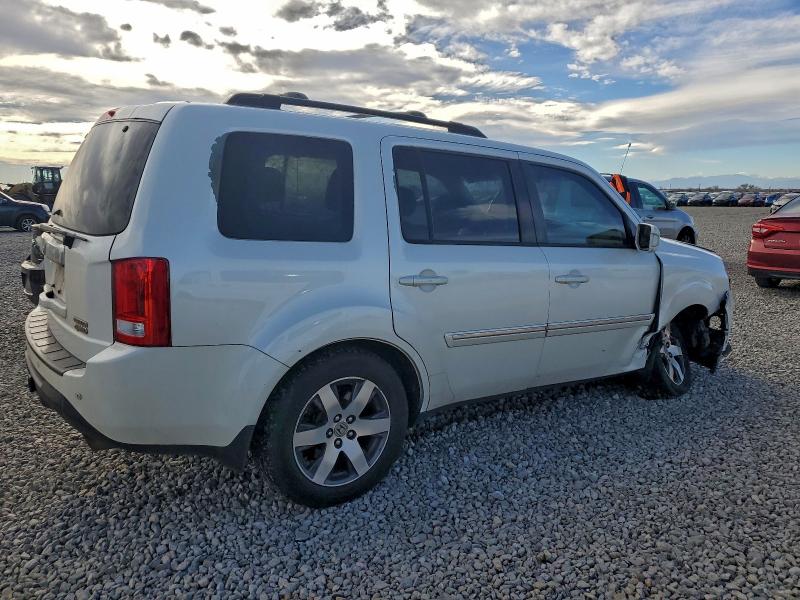 Photo 3 from auction – 2012 HONDA PILOT TOUR with VIN 5FNYF4H90CB057672