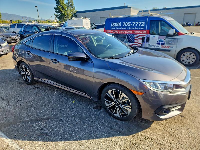 Photo 4 from auction – 2018 HONDA CIVIC EXL with VIN JHMFC1F76JX034155