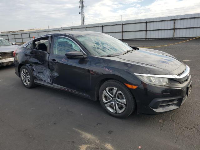 Photo 4 from auction – 2017 HONDA CIVIC LX with VIN 2HGFC2F50HH575854