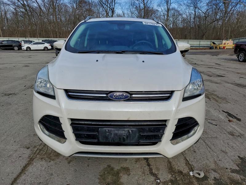 Photo 5 from auction – 2016 FORD ESCAPE TIT with VIN 1FMCU0JX0GUA63224