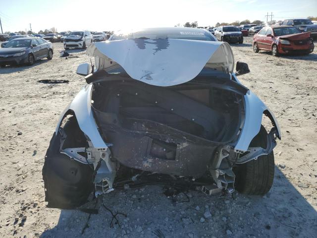 Photo 5 from auction – 2022 TESLA MODEL Y with VIN 7SAYGDEE6NF329954