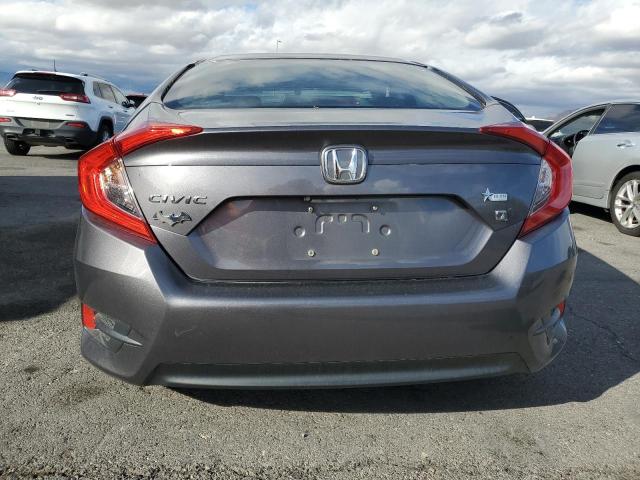 Photo 6 from auction – 2016 HONDA CIVIC EX with VIN 19XFC2F76GE042921