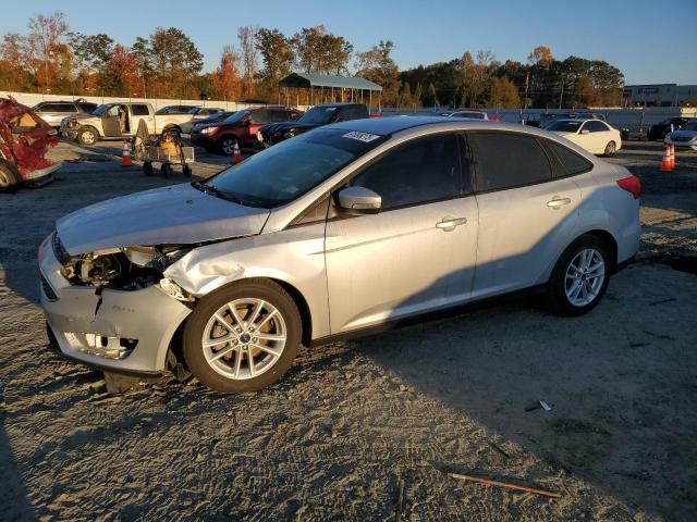 FORD FOCUS SE 2017 with VIN 1FADP3F28HL317399 - Photo from auction